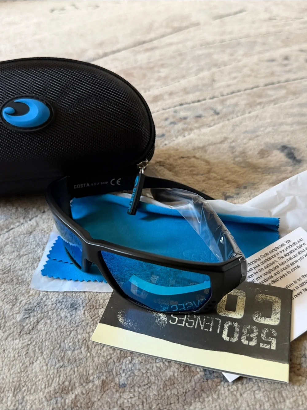 Costa Black Frame Sunglasses with Blue Mirrored Lenses